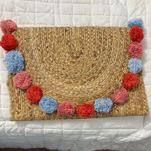 Woven Clutch with Colorful Pom Poms